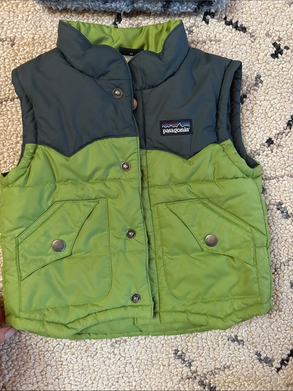 Patagonia Kids Green and Black Puffer Vest with Fuzzy Bear Beanie 12/18m